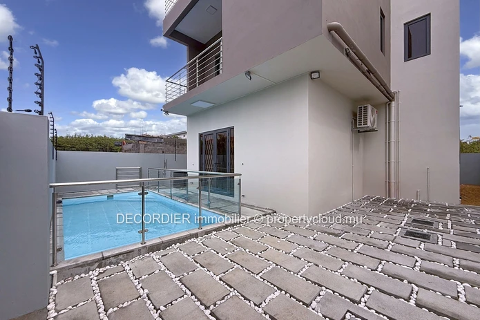 Elegant villa under construction with pool & garden