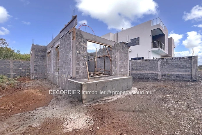 Elegant villa under construction with pool & garden